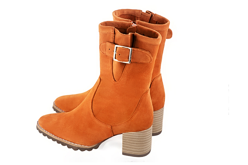 Apricot orange women's ankle boots with buckles on the sides. Round toe. Medium block heels. Rear view - Florence KOOIJMAN